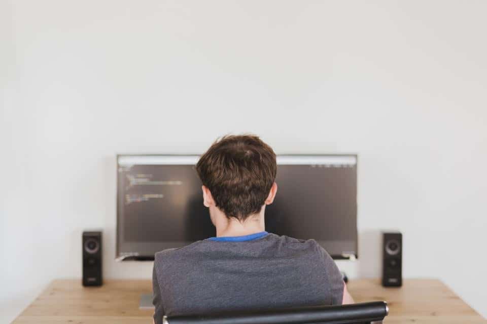 Person working at a desktop computer